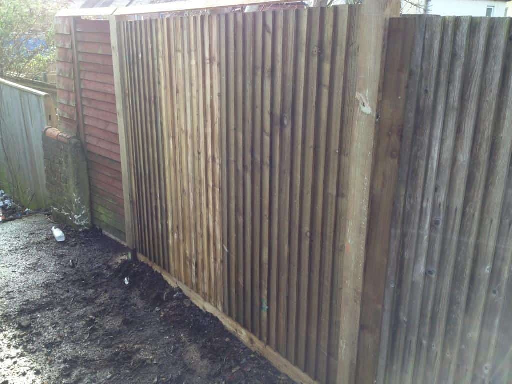 closed board fence rebuilt